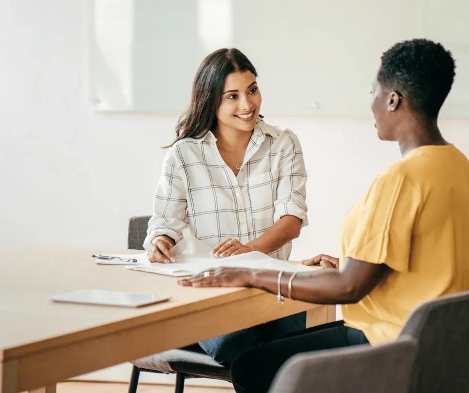 Australian professional reviewing a curriculum vitae template on a tablet.