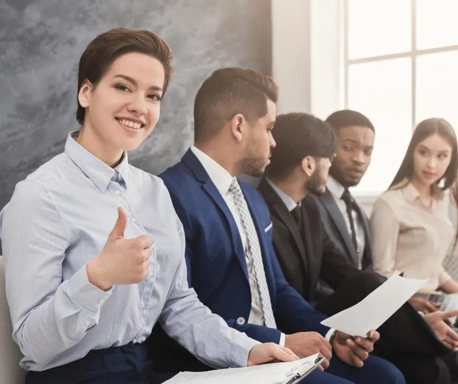 Consulting team reviewing strategy dashboards in a meeting room.