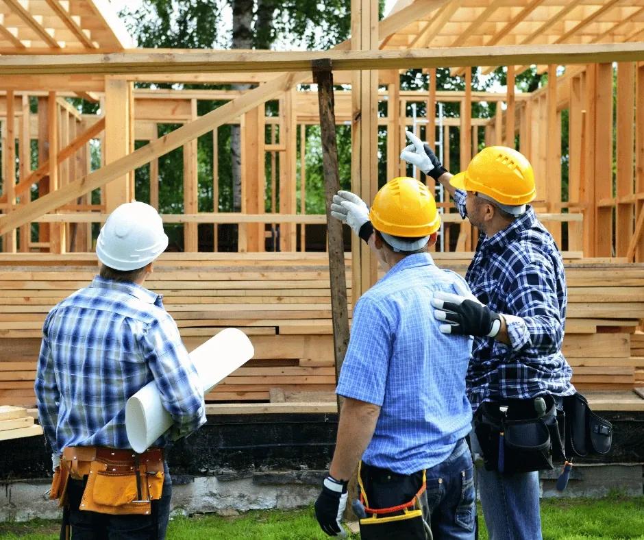 Trade assistant checking tools on a construction site.