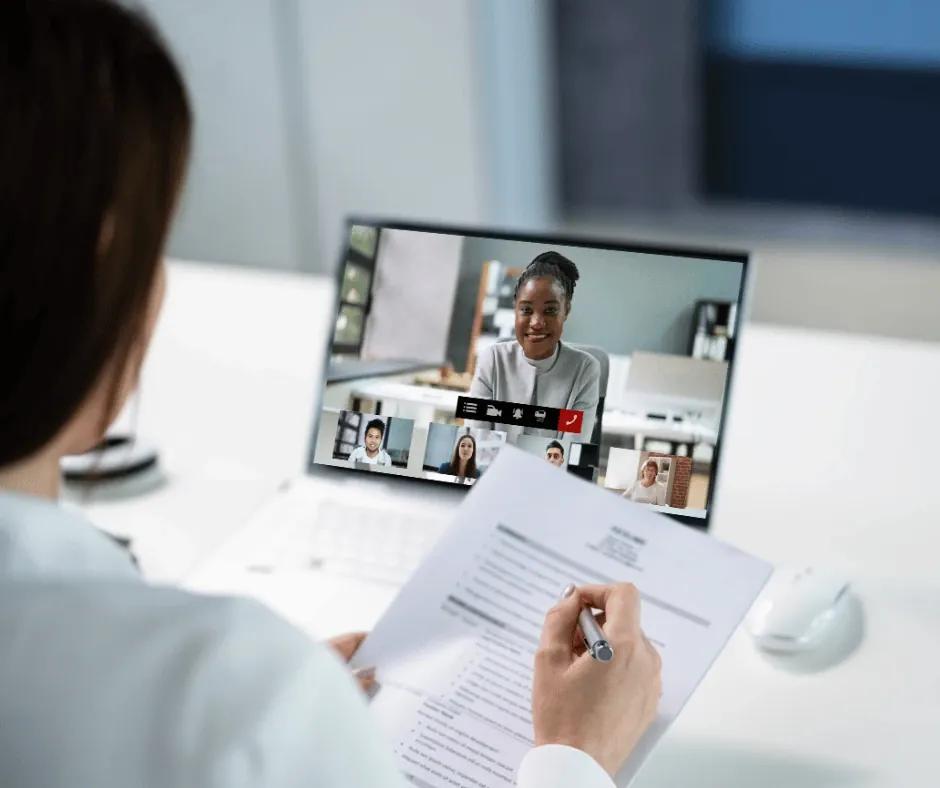 Professional refining a resume with market data dashboards open.