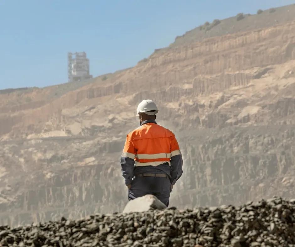 Candidate editing a cover letter template on a laptop.